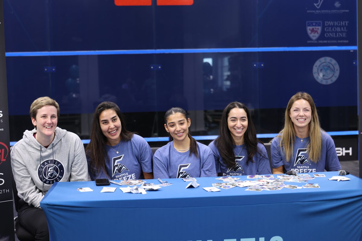 Freeze players signing autographs on the road at the Sono Sharks, February 28